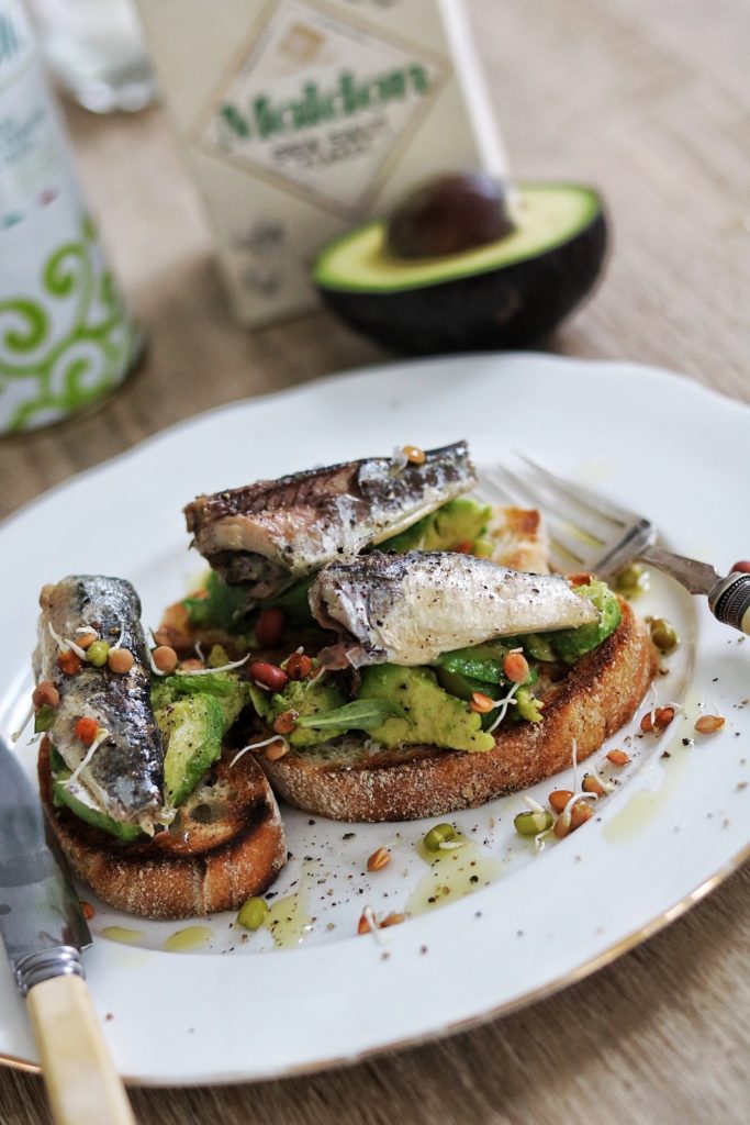 Toasted sourdough with sardines and smashed avocado