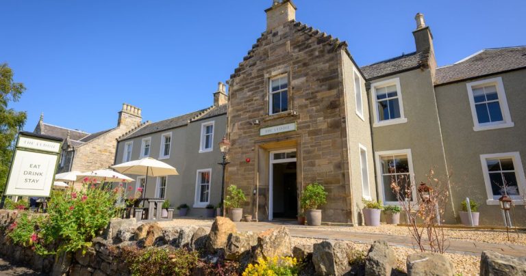 The Leddie Hotel front entrance with outdoor seating area