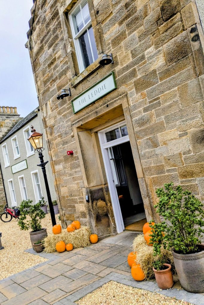 Entrance to The Leddie with pumpkins outside