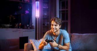 Lepro O1 AI Standing Lamp in gaming room with bright RGB lighting