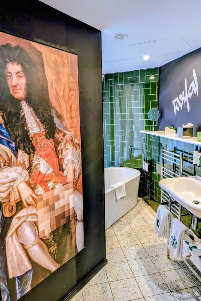 King Charles II adorning the bathroom wall