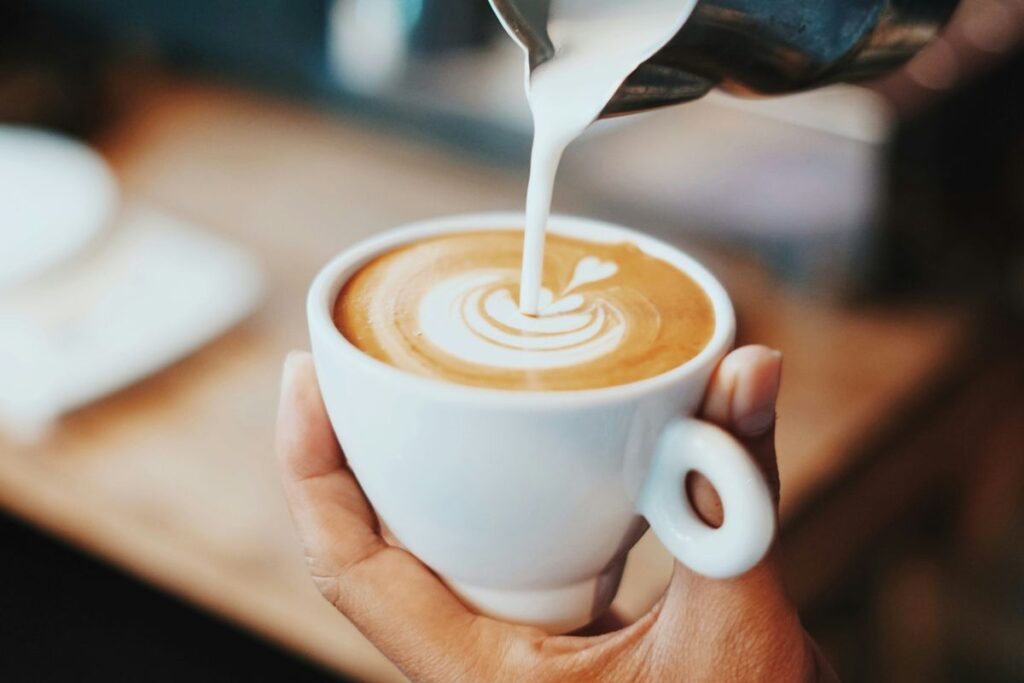 Cup of coffee in man's hand